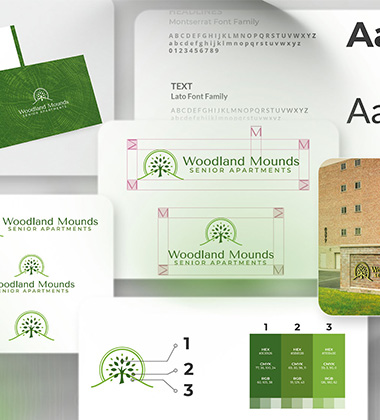 Brand collage for Woodland Mounds Senior Apartments featuring the green tree logo and name, plus sample business cards and a building image on a white background.